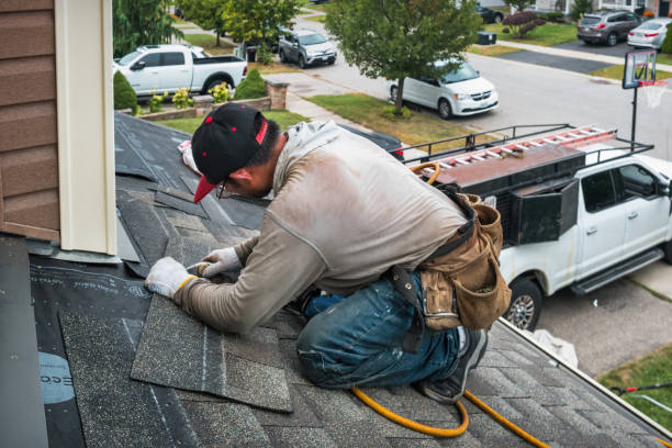 Professional Flat Roof Repair technician working in Lake, MI